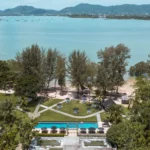 Aerial view of The Mangrove by Blu Monkey pool, gardens and Chalong Bay