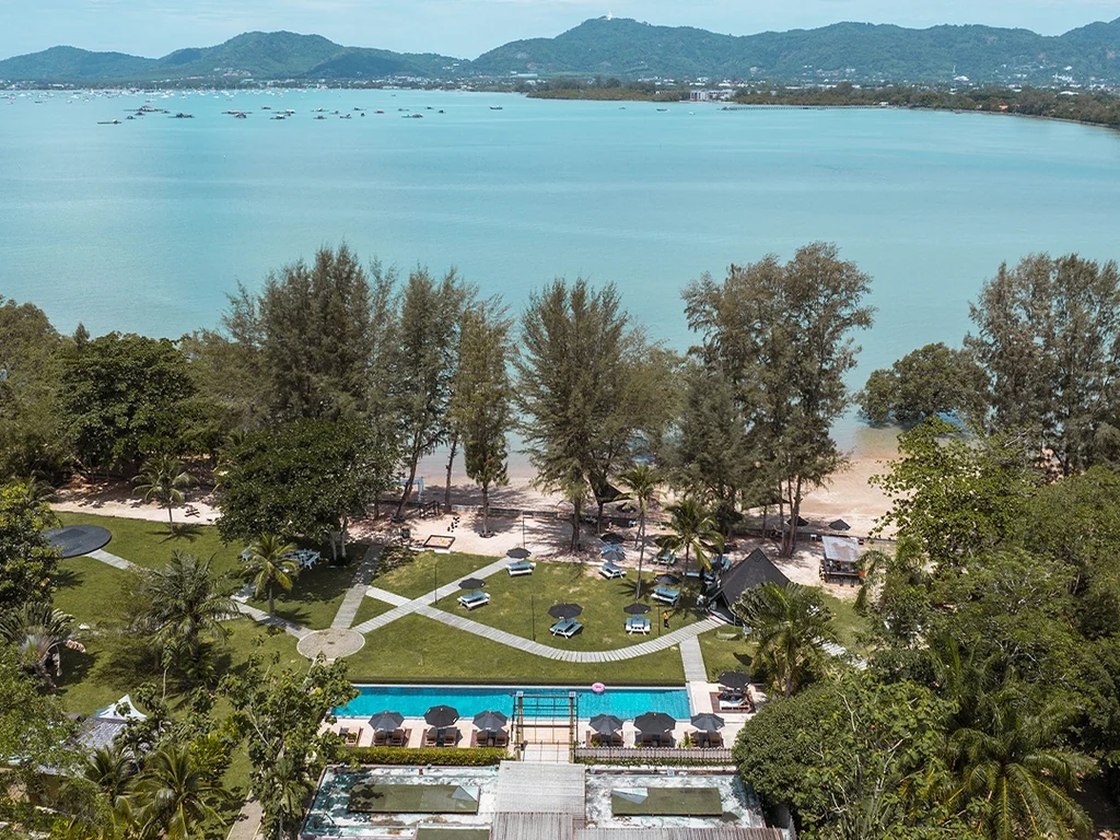 Aerial view of The Mangrove by Blu Monkey pool, gardens and Chalong Bay