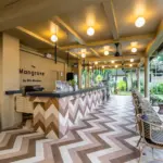Covered reception and seating area at The Mangrove by Blu Monkey